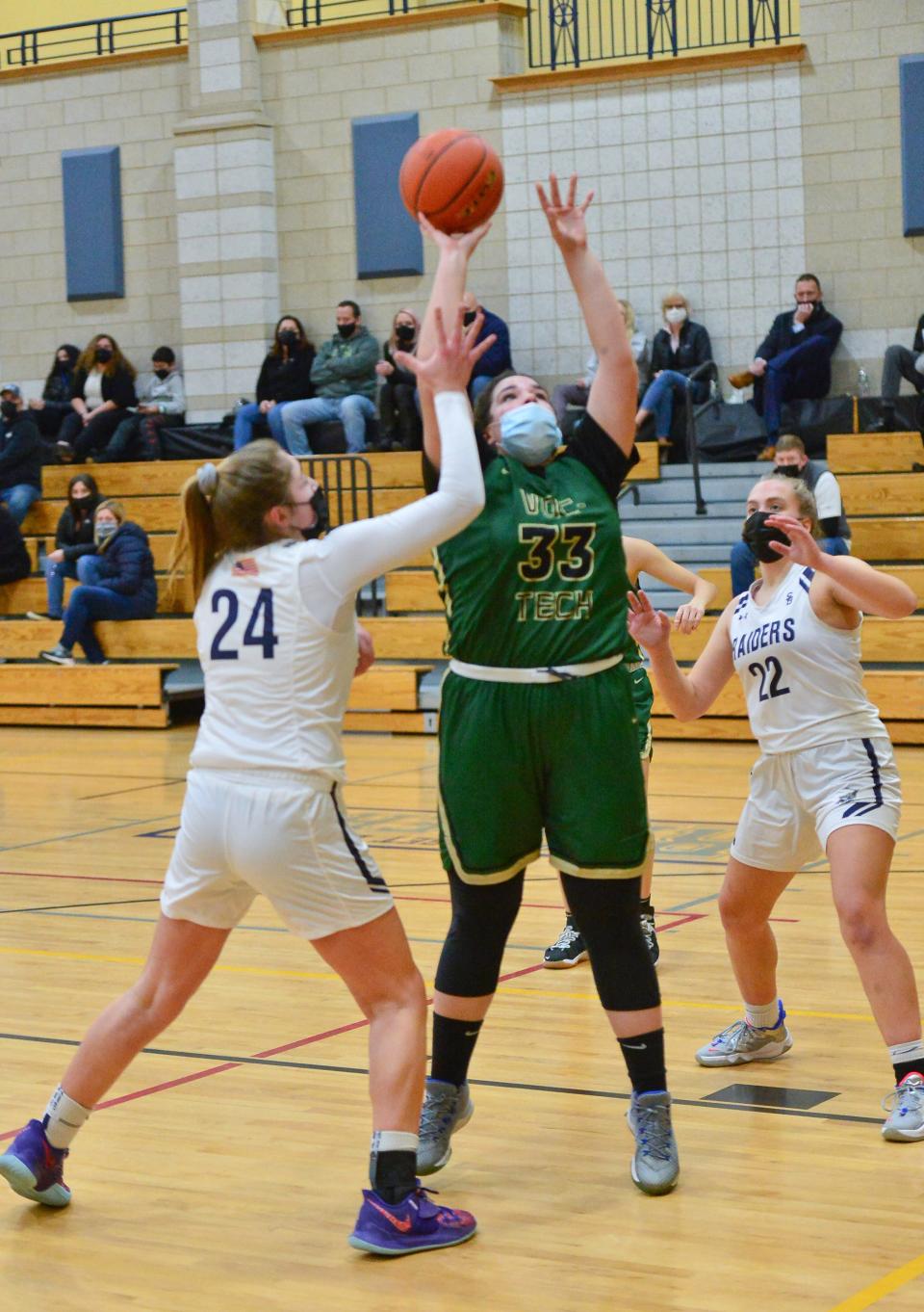 Greater New Bedford's Jillian McDonald attempts a shot past Somerset Berkley's Gabriella Nugent during Wednesday night's game.