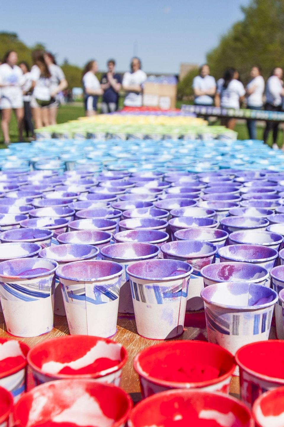 Students celebrate Holi on Friday, April 26, 2019, at the South Quad on the campus of Notre Dame. Holi, an Indian cultural event, marks the coming of spring or dry season in India and is celebrated by throwing powdered colors.