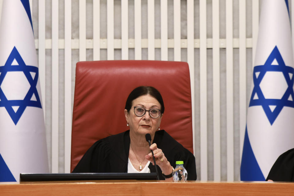 President of the Israeli Supreme Court Esther Hayut assembles to hear petitions against a law that would make it harder to remove a sitting prime minister at the court premises in Jerusalem, Thursday, Sept. 28, 2023. (Menahem Kahana/Pool Photo via AP)