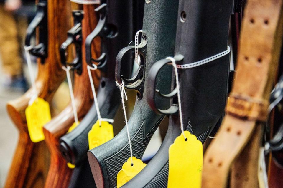 PHOTO: Guns on a rack for sale at Craig Taylor's table at the gun show held in the Augusta Civic Center in Augusta, Maine on Jan. 16, 2016. (Whitney Hayward/Portland Press Herald via Getty Images, FILE)