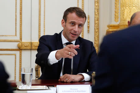 French President Emmanuel Macron chairs the weekly cabinet meeting at the Elysee Palace in Paris, France October 17, 2018. Francois Mori/Pool via REUTERS