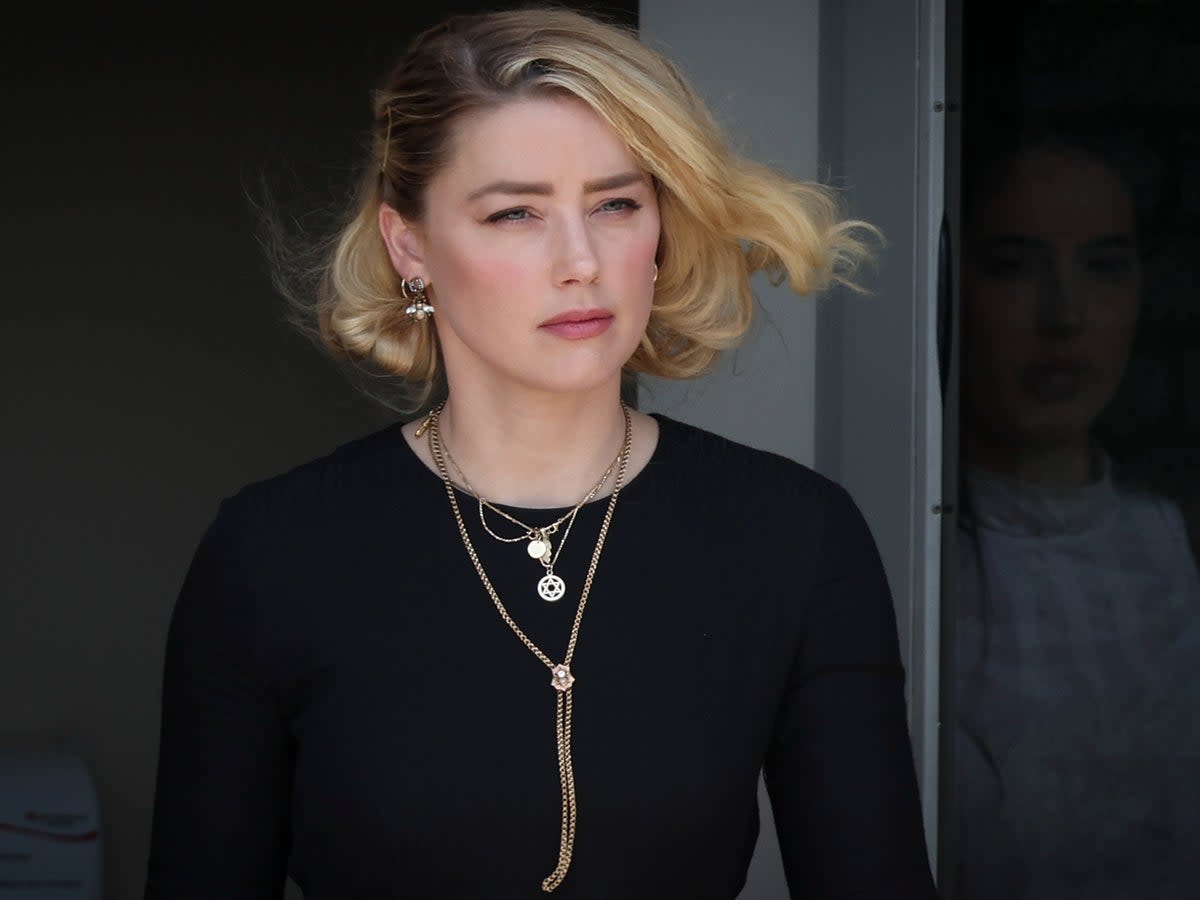 Amber Heard departs the Fairfax County Courthouse on 1 June 2022 in Fairfax, Virginia (Win McNamee/Getty Images)