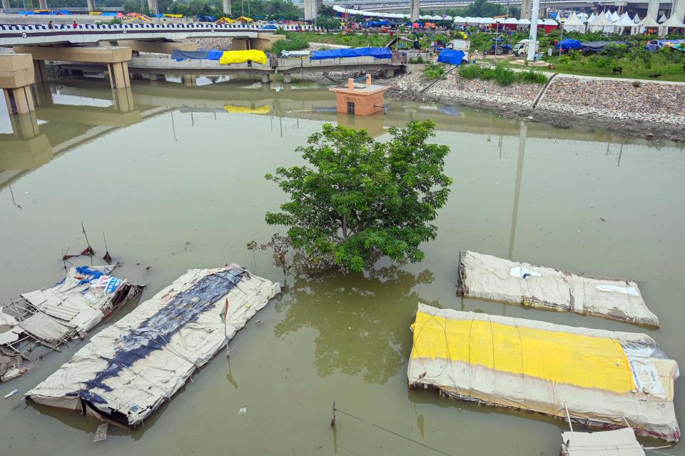 As flood waters recede, some houses are still submerged in New Delhi, India. / Credit: Vipin Kumar/Hindustan Times via Getty Images
