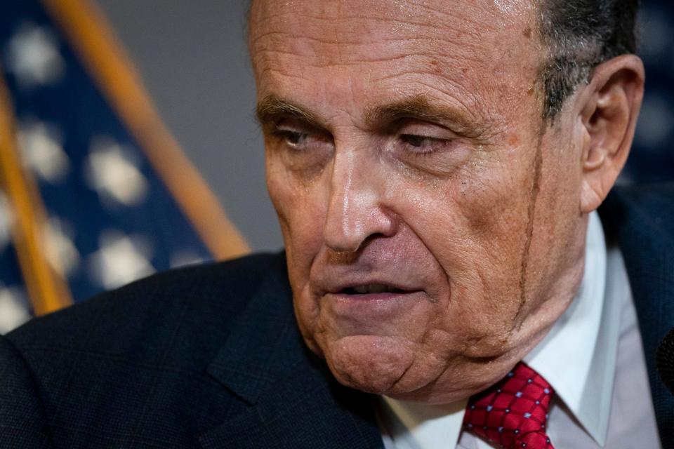 Rudy Giuliani speaks to the press about various lawsuits related to the 2020 election on Nov. 19  inside the Republican National Committee headquarters.