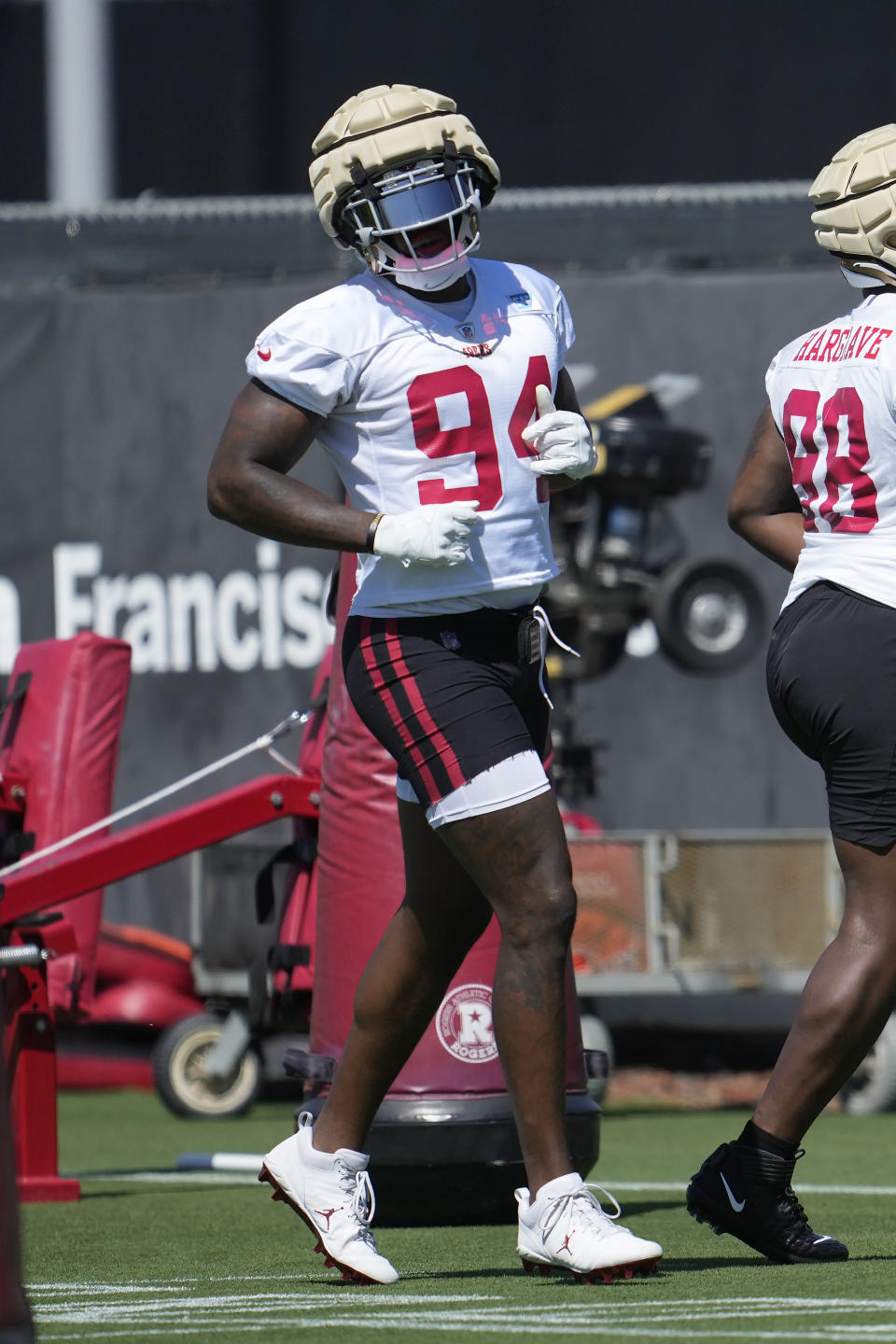 San Francisco 49ers' Clelin Ferrell takes part during the NFL team's football training camp in Santa Clara, Calif., Wednesday, July 26, 2023. Ferrell had seen his good friend and former Raiders teammate Arden Key turn one good year in San Francisco into two more lucrative contracts, and decided to follow suit by signing a one-year deal that could be worth up to $2.5 million if he meets playing time incentives.(AP Photo/Jeff Chiu)