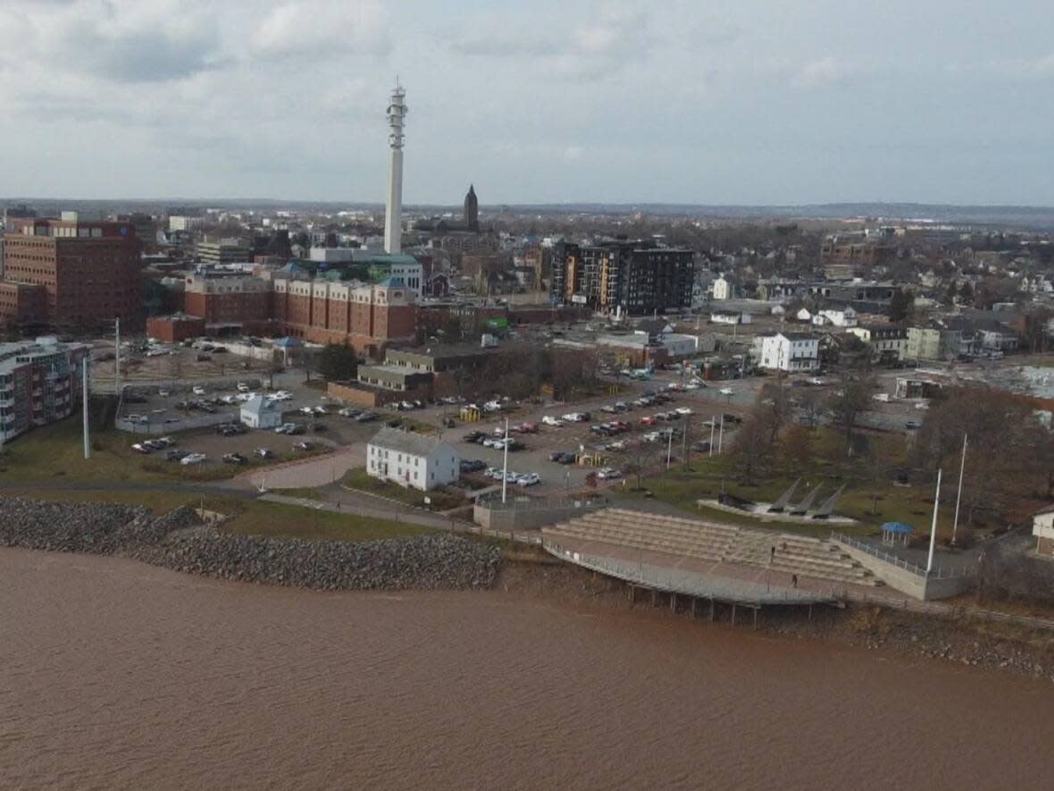 Moncton plans to add rock to protect its Riverfront Trail, shown in 2020, and an outlook in front of Bore Park from further erosion. The city added rock to a 100 metre section on the left in 2019.  (Shane Fowler/CBC - image credit)