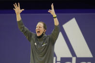 Washington head coach Mike Hopkins reacts near the bench during the first half of an NCAA college basketball game against Utah, Sunday, Jan. 24, 2021, in Seattle. (AP Photo/Ted S. Warren)