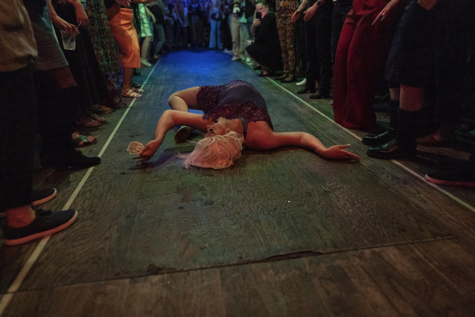 Drag queen Harpy Daniel, aka Joshua Kelley, performs at the Rainbow Special Interest Group of NAFSA: Association of International Educators reception at Pitchers and a League of Her Own bar in Washington, Wednesday, May 31, 2023. (AP Photo/Carolyn Kaster)