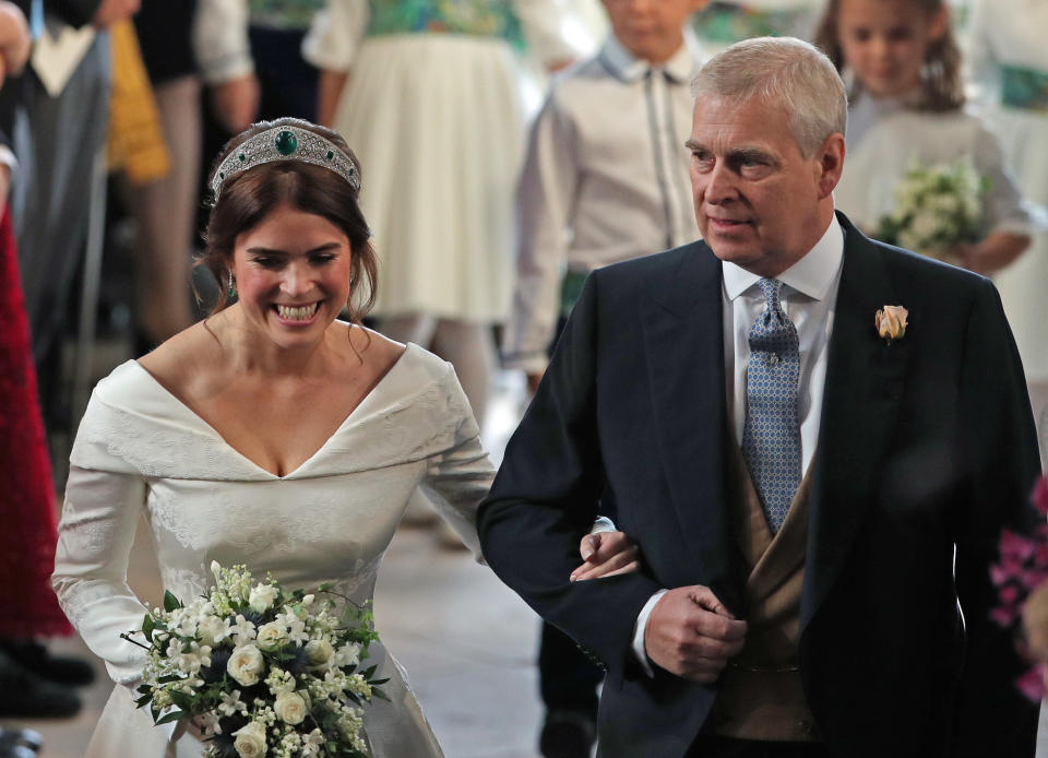 The Duke of York walks his daughter Princess Eugenie down the aisle on her wedding day (PA)