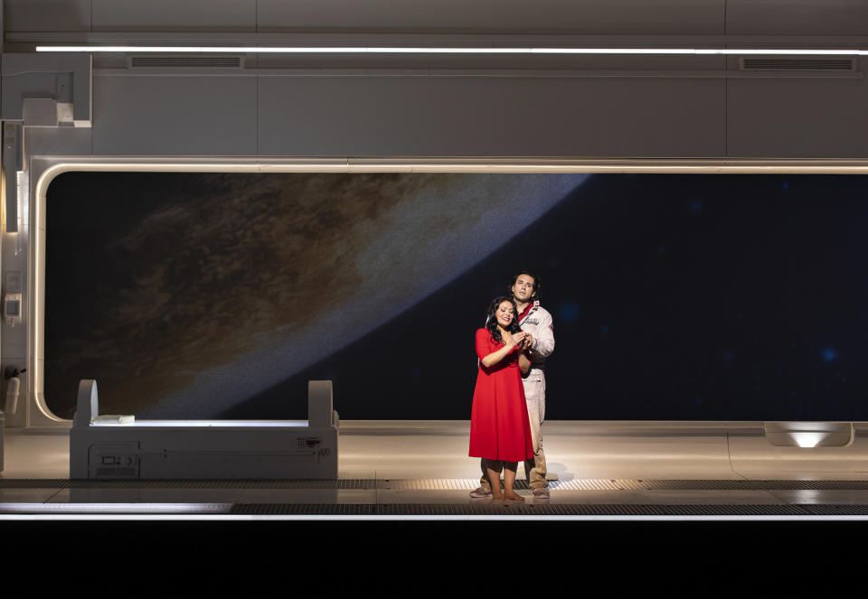 Soprano Ailyn Pérez as Mimi, left, and tenor Joshua Guerrero appear during the final dress rehearsal of a revival of Claus Guth’s production of Puccini’s “La Bohème” at Paris’ Opéra Bastille, on on April 29, 2023. (Opéra national de Paris via Associated Press)