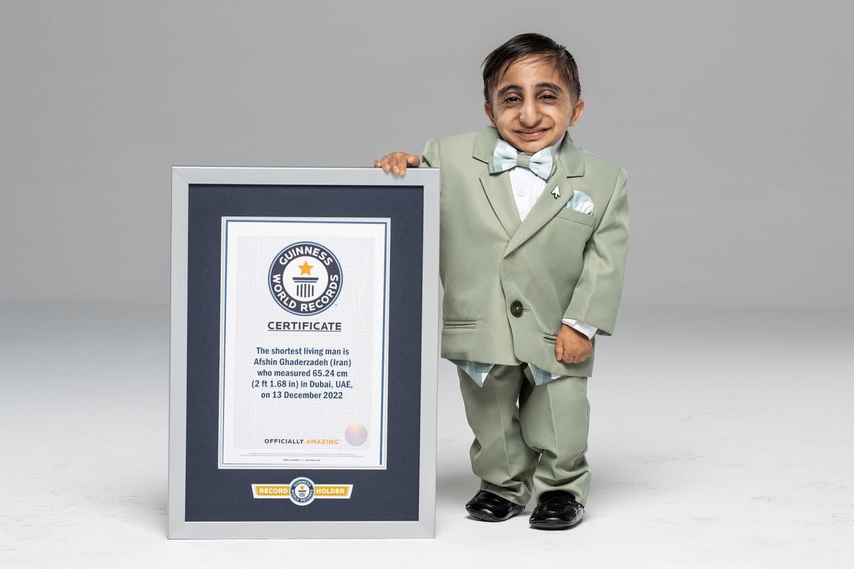 Shortest Man (living) The shortest living man is Afshin Ghaderzadeh (Iran) who measured 65.24 cm (2 ft 1.68 in) in Dubai, UAE, on 13 December 2022