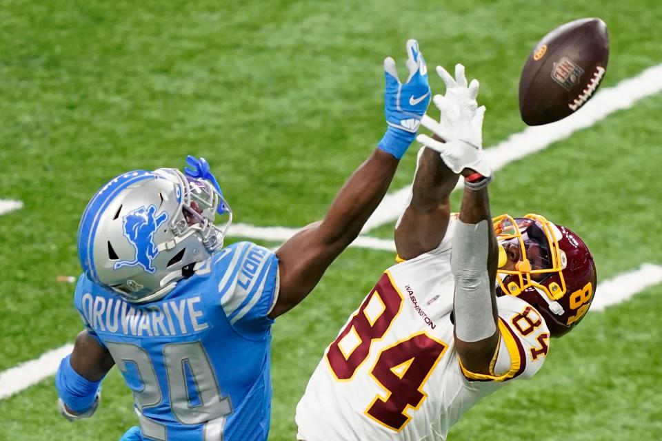 Detroit Lions cornerback Amani Oruwariye deflects a pass intended for Washington Football Team wide receiver Jeff Badet during the second half Sunday, Nov. 15, 2020, in Detroit.