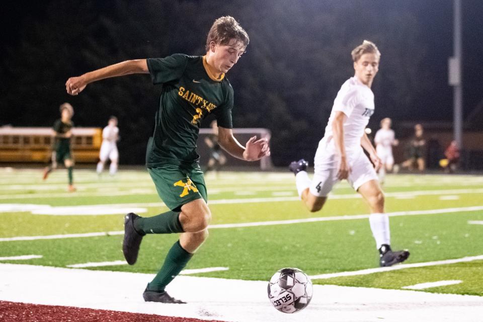 Scenes from St. Xavier's 2-1 victory over Trinity in double overtime in the semi-regional soccer game Thursday evening. Oct. 14, 2021