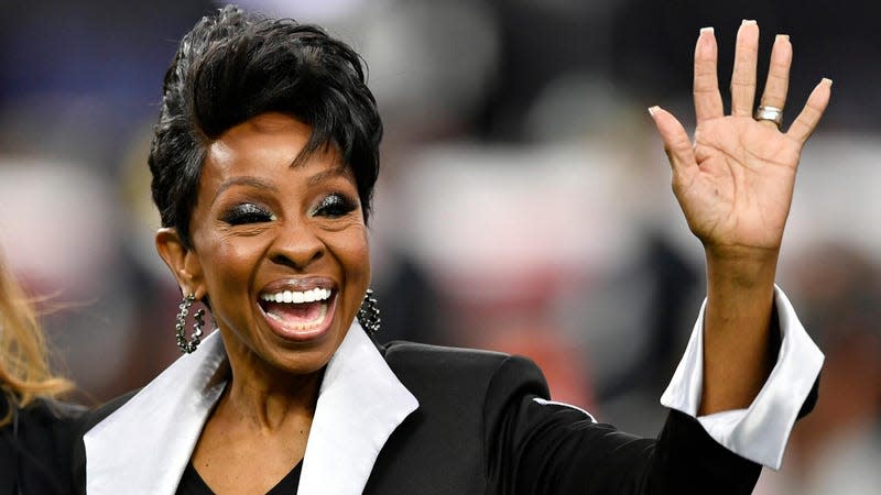 Gladys Knight waves after performing the national anthem ahead of a game between the Baltimore Ravens and the Las Vegas Raiders on September 13, 2021 in Las Vegas, Nevada.