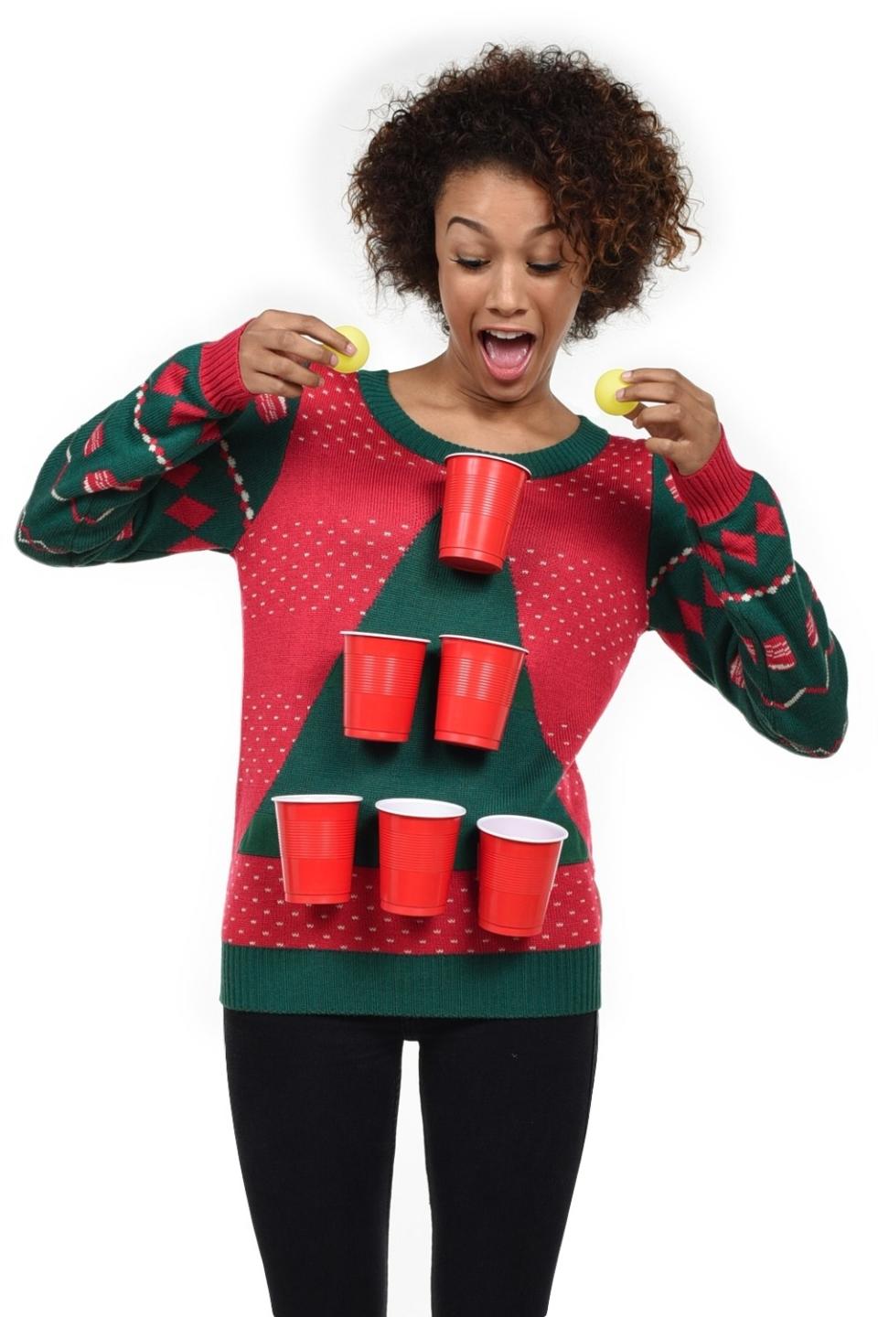 <p><strong>Women's Beer Pong Sweater:</strong> You know, just in case all the tables are taken.</p> <p><a rel="nofollow noopener" href="http://www.tipsyelves.com/womens-beer-pong-christmas-sweater?mbid=synd_yahoostyle" target="_blank" data-ylk="slk:Tipsyelves.com;elm:context_link;itc:0;sec:content-canvas" class="link ">Tipsyelves.com</a>, $69.</p>