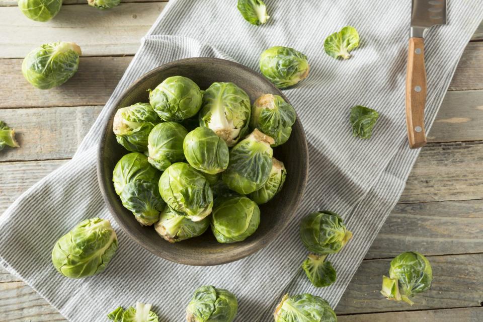 <p>These cruciferous vegetables feature sulfur compounds called glucosinolates, shown to help lower your risk for several types of cancer. Loaded with iron and potassium, a cup of Brussels sprouts also features 54 mcg of folate—about 14 percent of your 400-mcg recommended daily allowance. Slice them in half and sauté them in salt, pepper, and garlic to enliven their natural flavor.</p><p><strong>Try it: </strong><a href="https://www.prevention.com/food-nutrition/recipes/a20526330/roasted-brussels-sprouts-red-onions-with-balsamic-vinegar/" rel="nofollow noopener" target="_blank" data-ylk="slk:Roasted Brussels Sprouts & Red Onions with Balsamic Vinegar;elm:context_link;itc:0;sec:content-canvas" class="link ">Roasted Brussels Sprouts & Red Onions with Balsamic Vinegar</a></p>