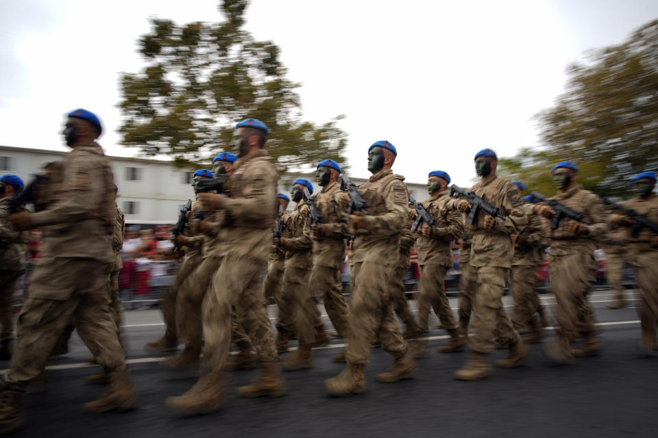 Turkey's army soldiers parade as part of celebrations marking the 100th anniversary of the creation of the modern, secular Turkish Republic, in Istanbul, Turkey, Sunday, Oct. 29, 2023. (AP Photo/Emrah Gurel)