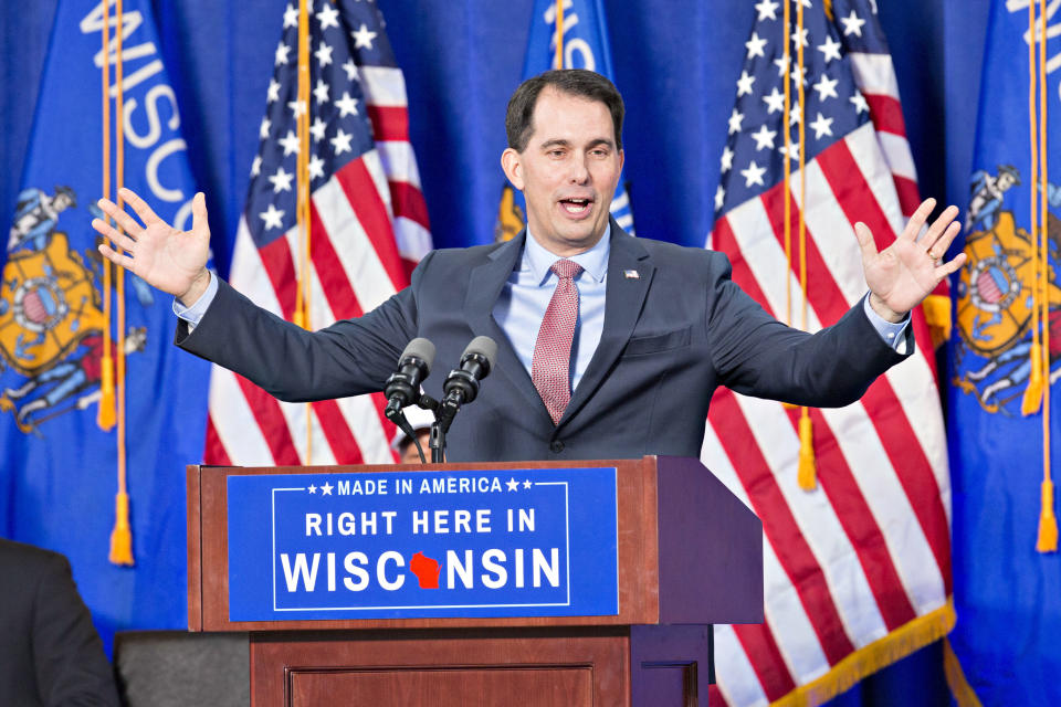 Scott Walker, the Republican governor of Wisconsin, speaks during an event for the signing of an Electronics and Information Technology Manufacturing Zone Tax Credit agreement in Racine, Wis., on Friday, Nov. 10, 2017. The agreement grants Foxconn $3 billion in tax incentives for a massive manufacturing office complex in southeastern Wisconsin. (Photo: Daniel Acker/Bloomberg)