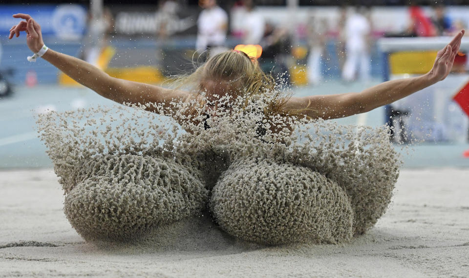 <p>Luisa Bodem competes during the women’s long jump event at the German indoor athletics in Leipzig, Germany, Feb. 19, 2017. (Photo: Hendrik Schmidt/AP) </p>