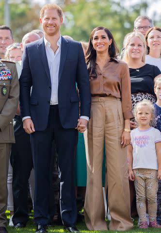 <p>Rolf Vennenbernd/picture alliance via Getty Images</p> Prince Harry and Meghan Markle at the Invictus Games on Sept. 14, 2023