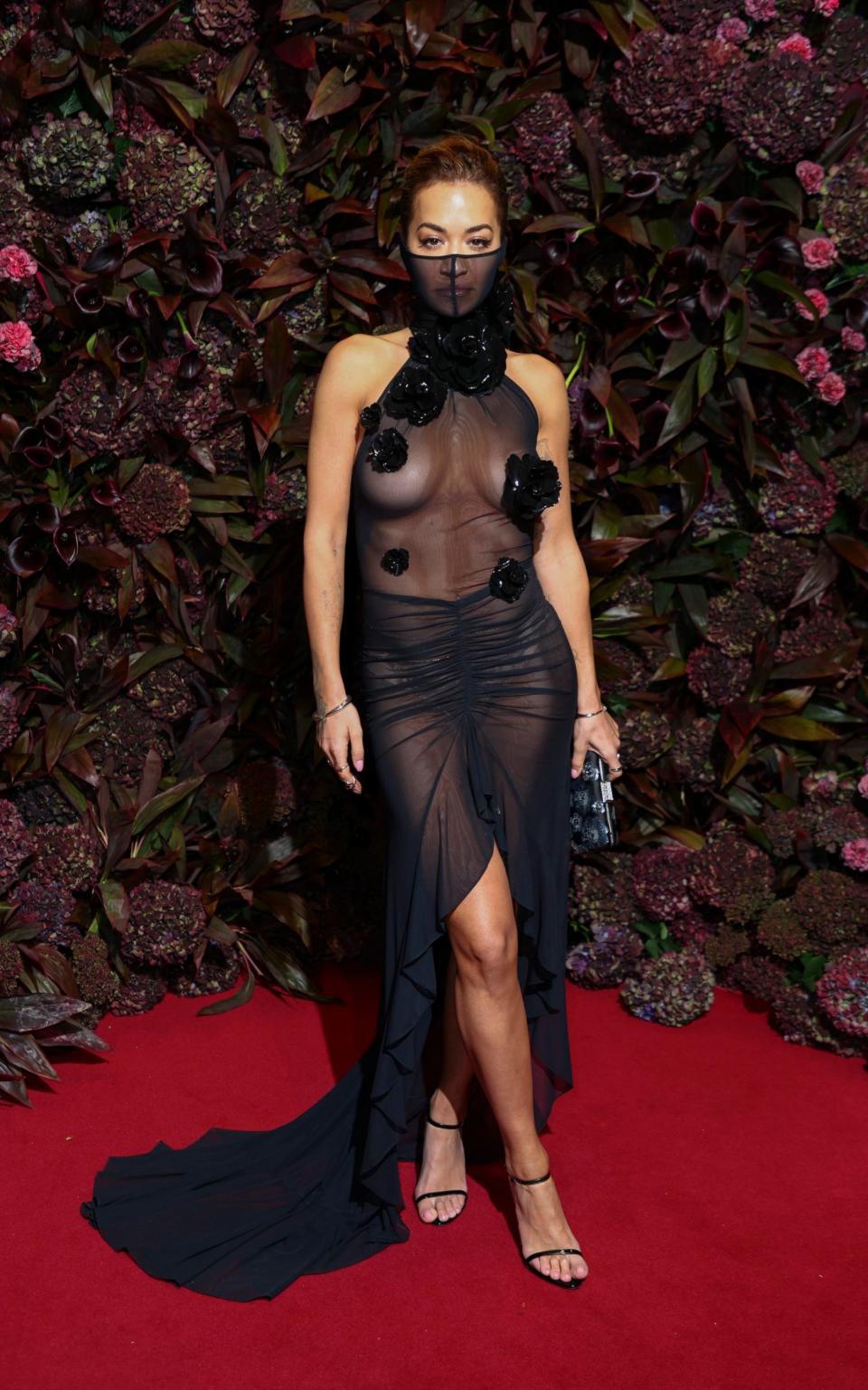 Rita Ora walks the Vogue Forces for Change red carpet in a David Koma design, 2023