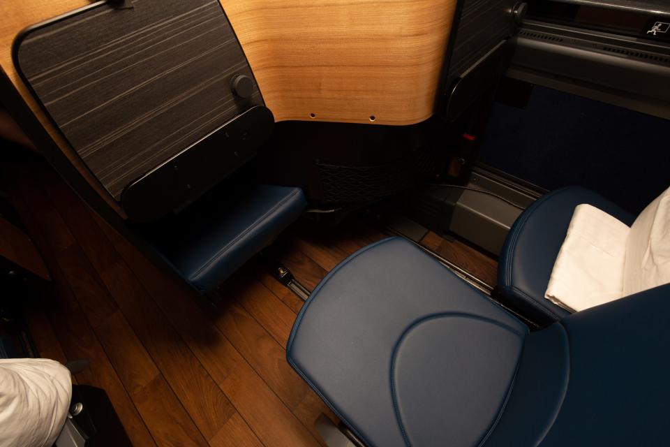 A seat facing a tray table.