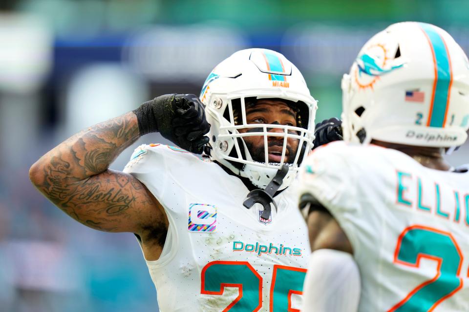 MIAMI GARDENS, FLORIDA - OCTOBER 08: Xavien Howard #25 of the Miami Dolphins celebrates after breaking up a pass against the New York Giants during the second quarter at Hard Rock Stadium on October 08, 2023 in Miami Gardens, Florida. (Photo by Rich Storry/Getty Images)