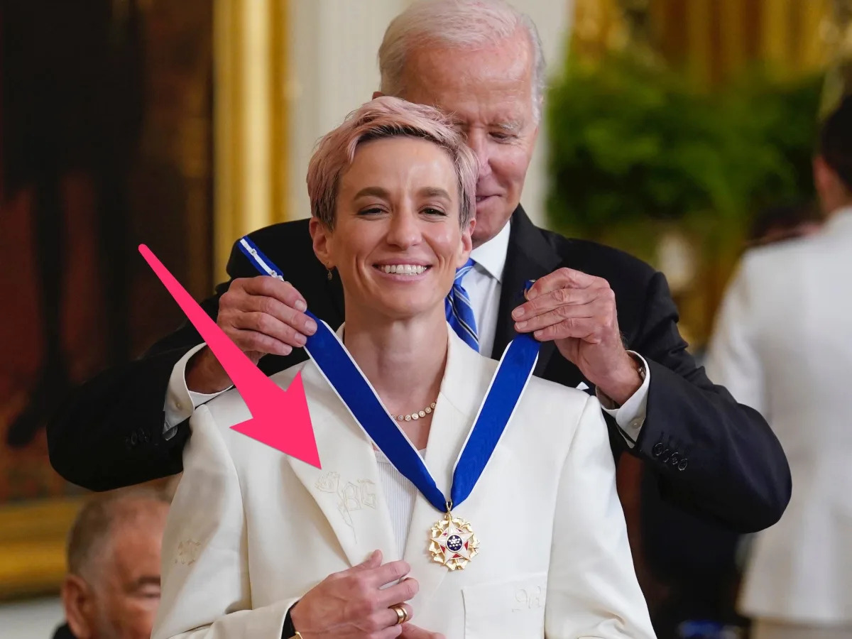 Megan Rapinoe used a not-so-hidden message to urge President Joe Biden to help b..