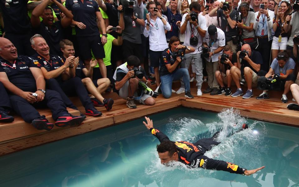 Daniel Ricciardo of Red Bull celebrates with a swan dive into the swimming pool of the Red Bull Energy Station after winning the 2018 Monaco Grand Prix - Could Monaco be the first grand prix Red Bull do not win this season? - Getty Images/Mark Thompson