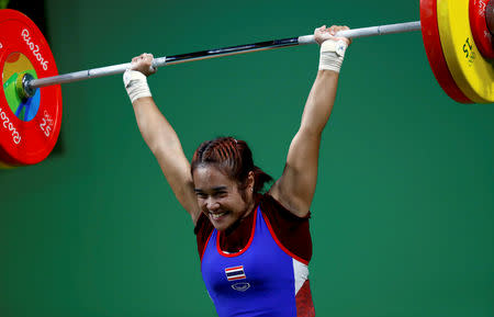 FILE PHOTO: 2016 Rio Olympics - Weightlifting - Final - Women's 48kg - Riocentro - Pavilion 2 - Rio de Janeiro, Brazil - 06/08/2016. Sopita Tanasan (THA) of Thailand competes. REUTERS/Kai Pfaffenbach