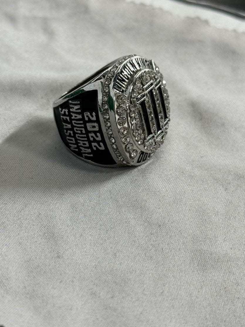 Marcus Green, Cornerstone Lincoln-King High School athletic director and head football coach, gave his team commemorative rings to celebrate the team's first season.