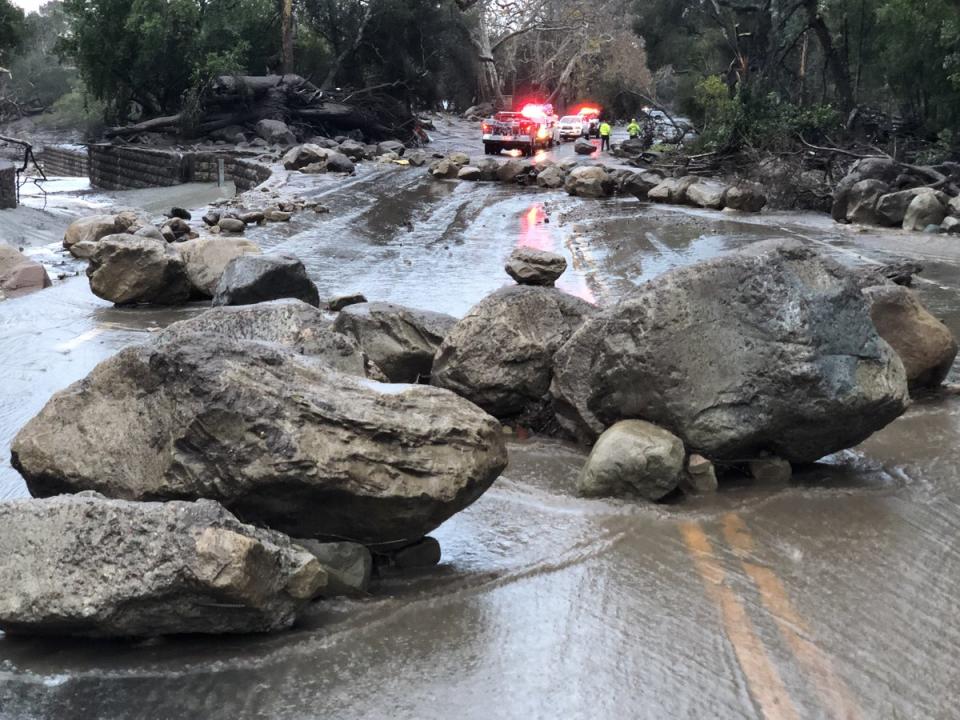 <p>Scene from the 300 block of Hot Springs Road in Montecito, Calif., following debris and mud flow due to heavy rain on Jan. 9, 2018. (Photo: Mike Eliason/Santa Barbara County Fire Department via Twitter) </p>