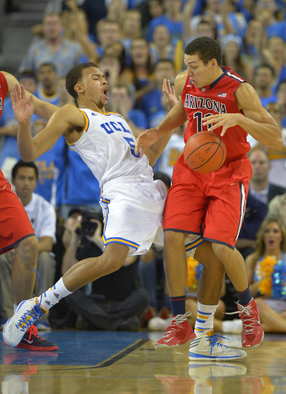 Arizona forward Aaron Gordon, right, collides with UCLA forward Kyle Anderson during the second half of an NCAA college basketball game on Thursday, Jan. 9, 2014, in Los Angeles. (AP Photo/Mark J. Terrill)