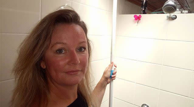 Clash of the pythons: Two snakes battle it out in shower before Qld mum  intervenes