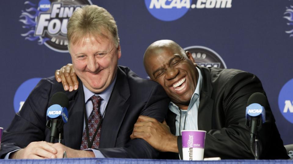 Magic Johnson and Larry Bird share a gritty, competitive laugh. (AP/Amy Sancetta)