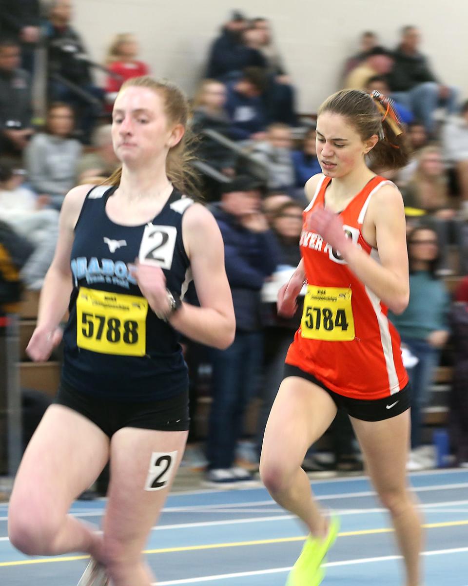 Oliver Ames’s Katie Sobieraj competes in the one mile race where she placed fourth with a time of 5:04.51 at the MIAA Meet of Champions at the Reggie Lewis Track Center in Boston on Saturday, Feb. 25, 2023.