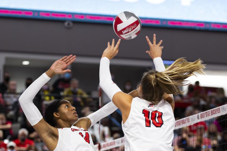 Ohio State's Arica Davis prepares to spike the ball set from Mac Podraza earlier this season. The Buckeyes are 25-5 and the No. 9 seed in the NCAA tournament.