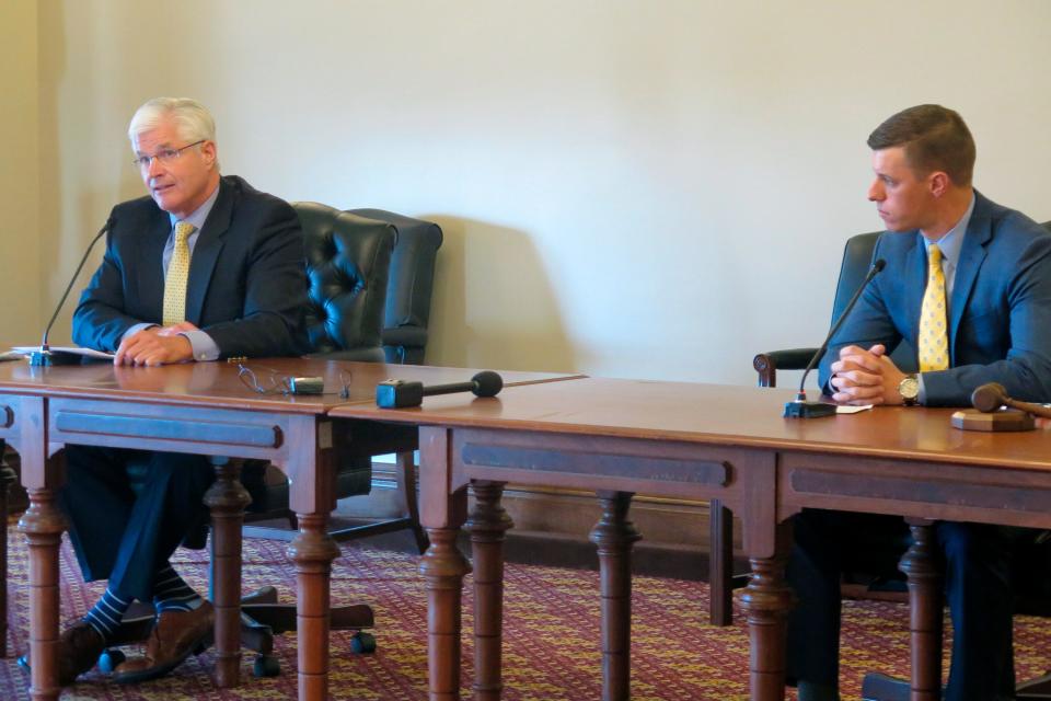 Michigan Republican Senate Majority Leader Mike Shirkey, left, and Republican House Speaker Lee Chatfield announce a lawsuit challenging Democratic Gov. Gretchen Whitmer's stay-at-home and other orders issued to combat the coronavirus pandemic on Wednesday, May 6, 2020, at the Capitol building in Lansing, Mich. The suit alleges her actions are unlawful because the Legislature did not extend a state of emergency.