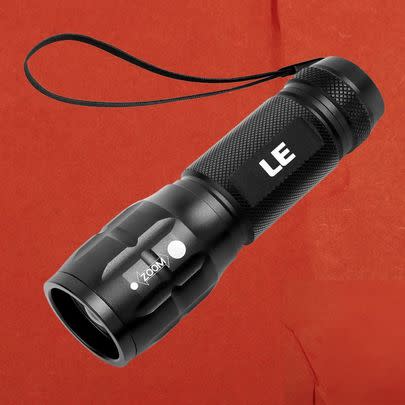 A high-lumens tactical flashlight