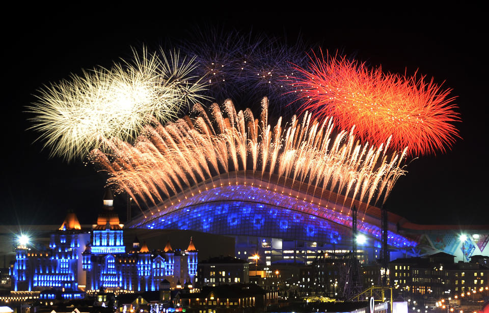 Fireworks explode over the Fisht Olympic Stadium at the begining of the Opening Ceremony of the Sochi Winter Olympics on February 7, 2014 in Sochi.