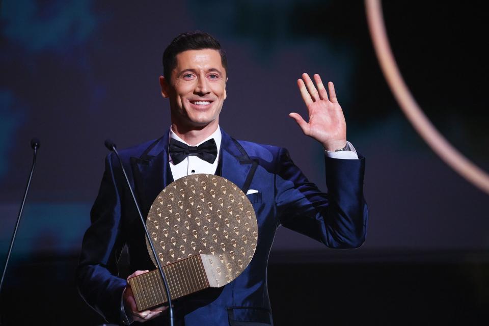 Seen here, Bayern Munich's Polish forward Robert Lewandowski with his 2021 Striker of the Year award.