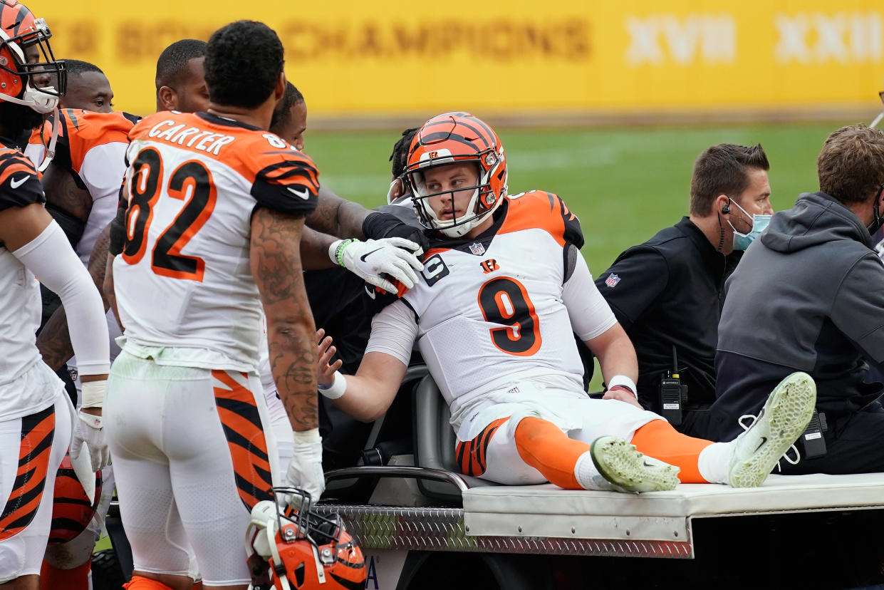 LANDOVER, MARYLAND - NOVEMBER 22: Joe Burrow #9 of the Cincinnati Bengals is injured during the third quarter against the Washington Football Team at FedExField on November 22, 2020 in Landover, Maryland. (Photo by Patrick McDermott/Getty Images)