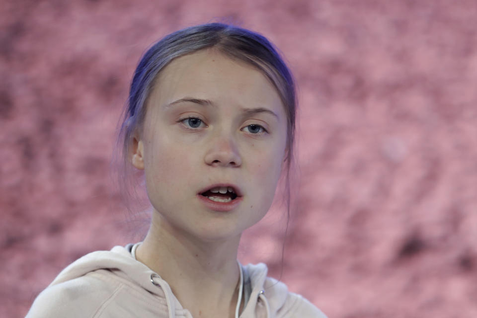 Swedish environmental activist Greta Thunberg addresses guests at the World Economic Forum in Davos, Switzerland, Tuesday, Jan. 21, 2020. The 50th annual meeting of the forum will take place in Davos from Jan. 21 until Jan. 24, 2020. (AP Photo/Michael Probst)