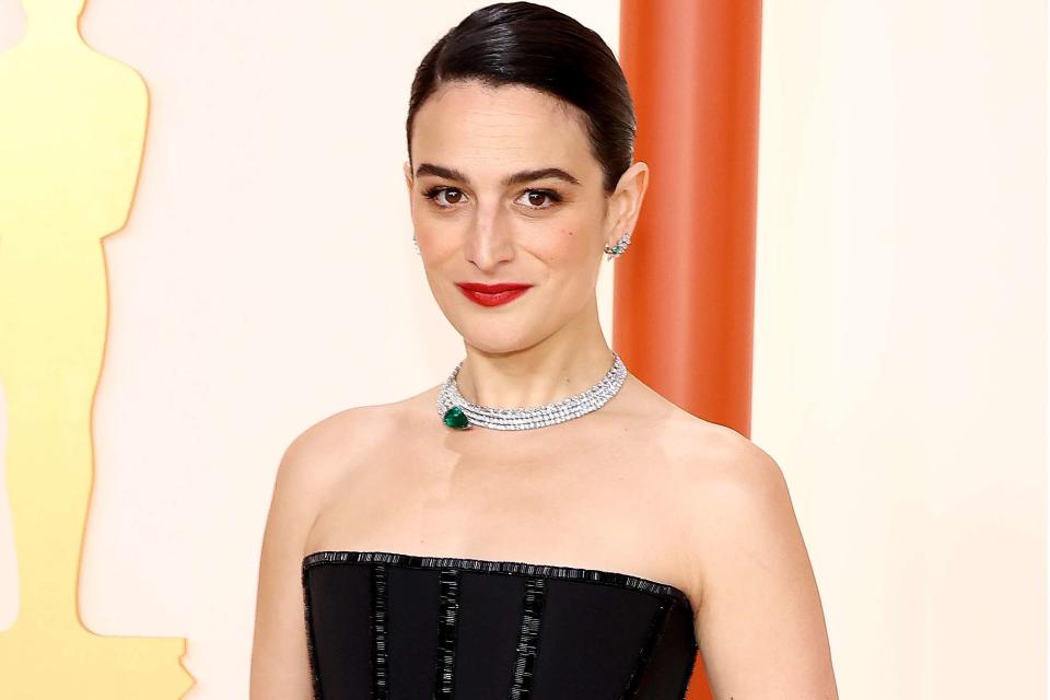 <p>Arturo Holmes/Getty</p> Jenny Slate attends the 95th Annual Academy Awards on March 12, 2023.