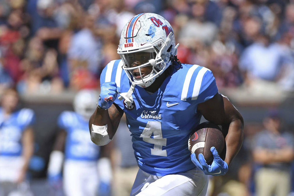 FILE - Mississippi running back Quinshon Judkins (4) runs during the second half of an NCAA college football game against Kentucky in Oxford, Miss., Saturday, Oct. 1, 2022. Ole Miss opens their season at home against Mercer on Sept. 2. (AP Photo/Thomas Graning, File)