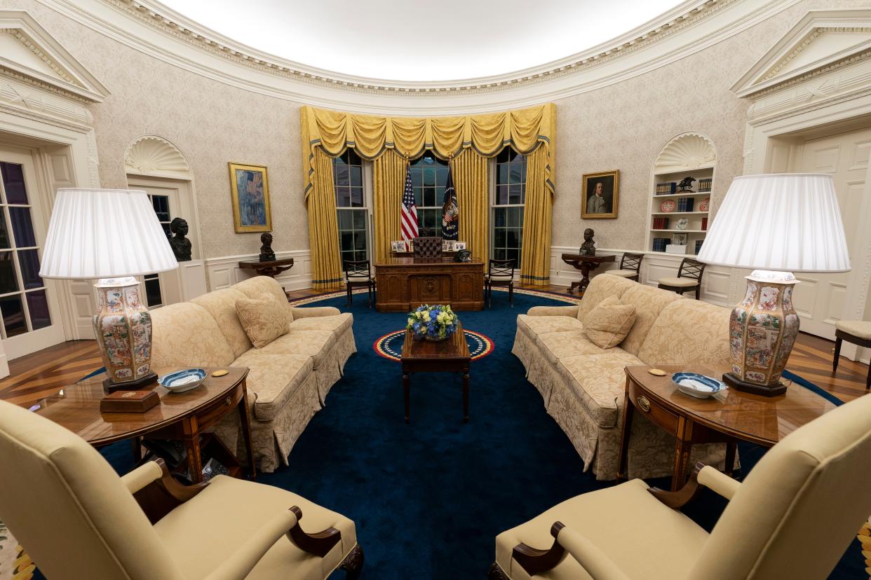 The Oval Office of the White House is newly redecorated for the first day of President Joe Biden's administration, including busts of civil rights leaders Rosa Parks, Martin Luther King Jr. and a bust of Abraham Lincoln, on Wednesday, Jan. 20, 2021, in Washington.