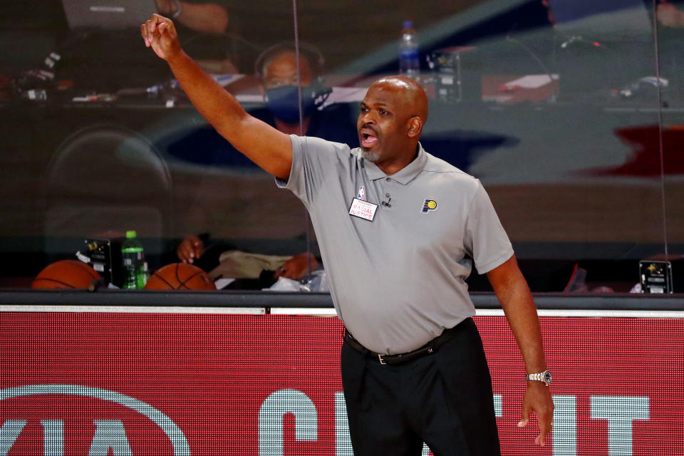 LAKE BUENA VISTA, FLORIDA - AUGUST 22:  Head coach Nate McMillan of the Indiana Pacers on the sideline during the second half of Game 3 of an NBA basketball first-round playoff series against the Miami Heat at AdventHealth Arena on August 22, 2020 in Lake Buena Vista, Florida. NOTE TO USER: User expressly acknowledges and agrees that, by downloading and or using this photograph, User is consenting to the terms and conditions of the Getty Images License Agreement. (Photo by Kim Klement - Pool/Getty Images)