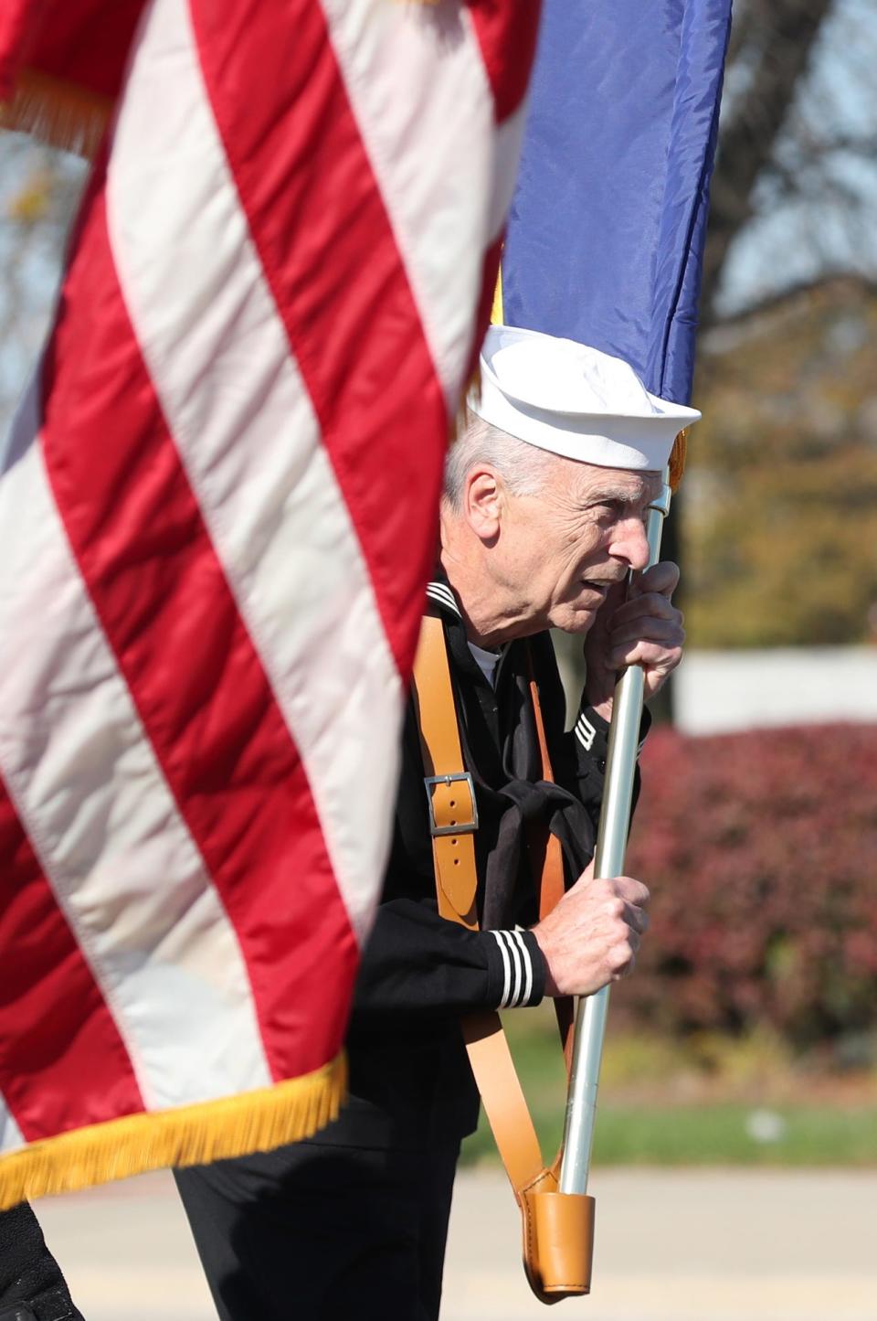 John Burke marches in the Veterans Day parade from Corktown down Michigan Ave. on Sunday, Nov. 7, 2021.