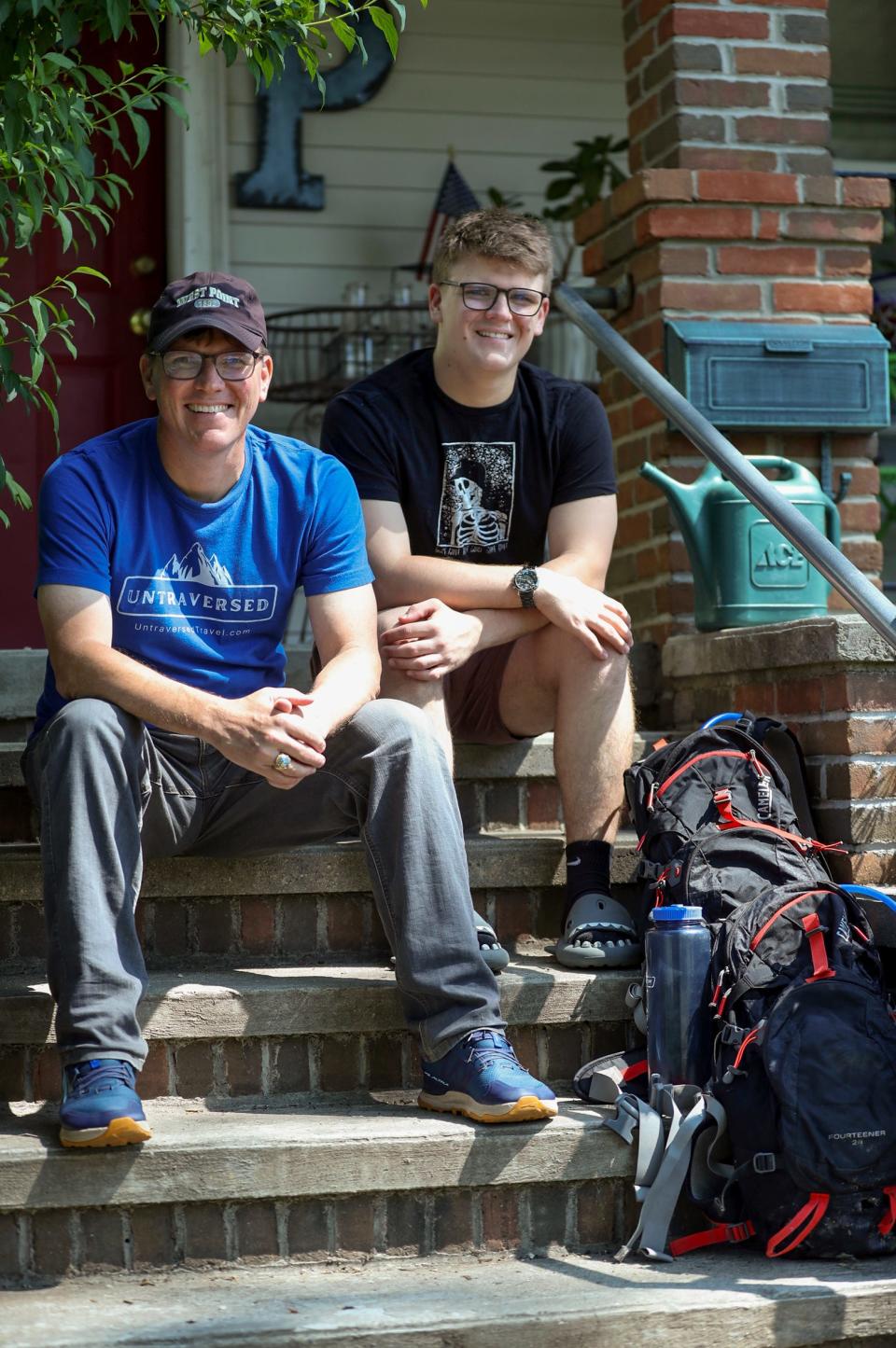 Jim Pool and his son, Elijah Pool, at their home in Ferndale Friday, June 9, 2023. The two recently completed a 52-mile hike in the Manistee National Forest in one day.