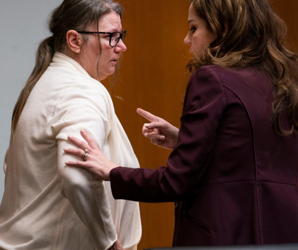 Jennifer Crumbley, left, stands with her attorney Shannon Smith after surveillance video was displayed for the jury showing the 2021 shooting at Oxford High School in the Oakland County courtroom of Cheryl Matthews on Thursday, Feb. 1, 2024.